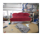 Sofa mit Klapparmlehne